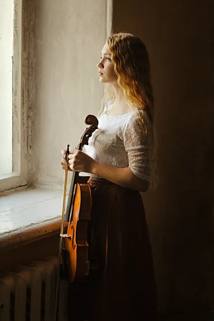 Big Fiddle Ink • Cello Player